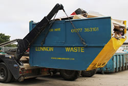 Skip Hire Great Dunmow full skip being unloaded