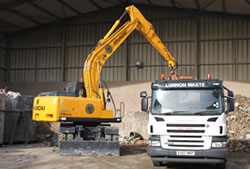 Skip Hire Great Dunmow unloading a lorry